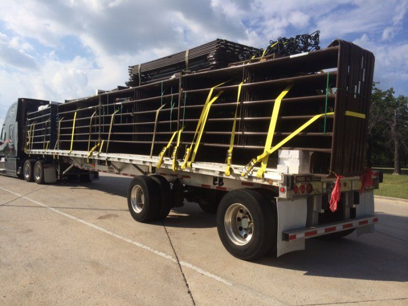 prime flatbed trailer loaded and strapped
