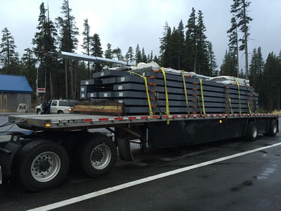 flatbed trailer loaded with steel beams at Donner's Summit
