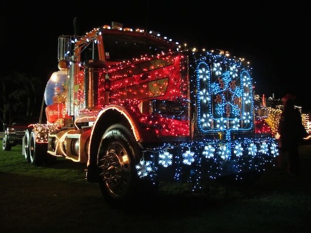 tractor trailer covered in christmas lights