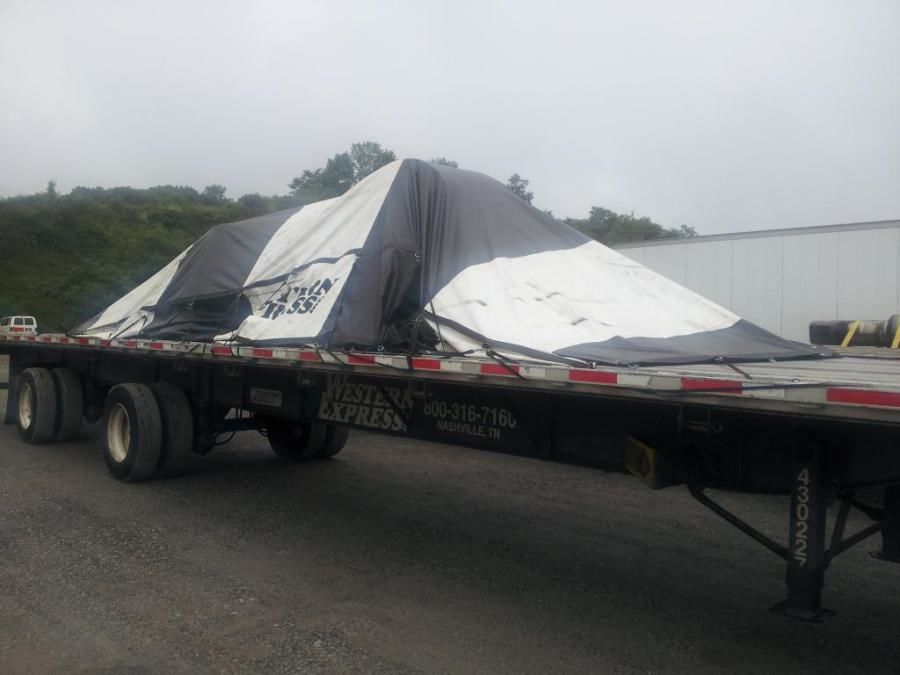 properly tarped load on a flatbed trailer