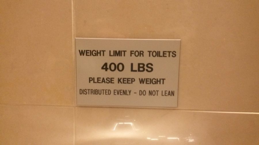 weight limit sign on toilet at TA truck stop