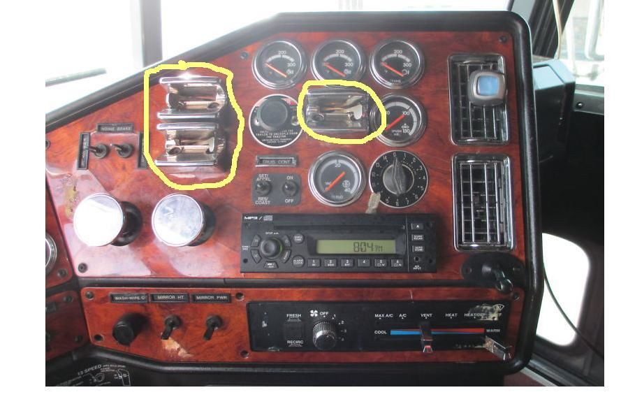 picture of truck dashboard with gauges and radio