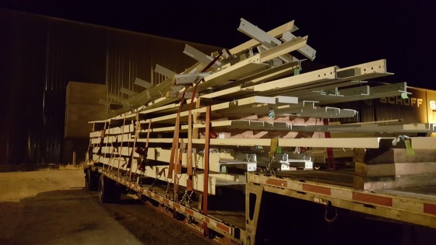 flatbed trailer loaded with structural steel parts