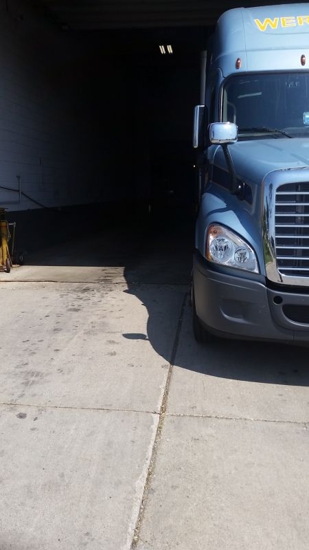 truck drivers picture of very narrow dock alley backing problem