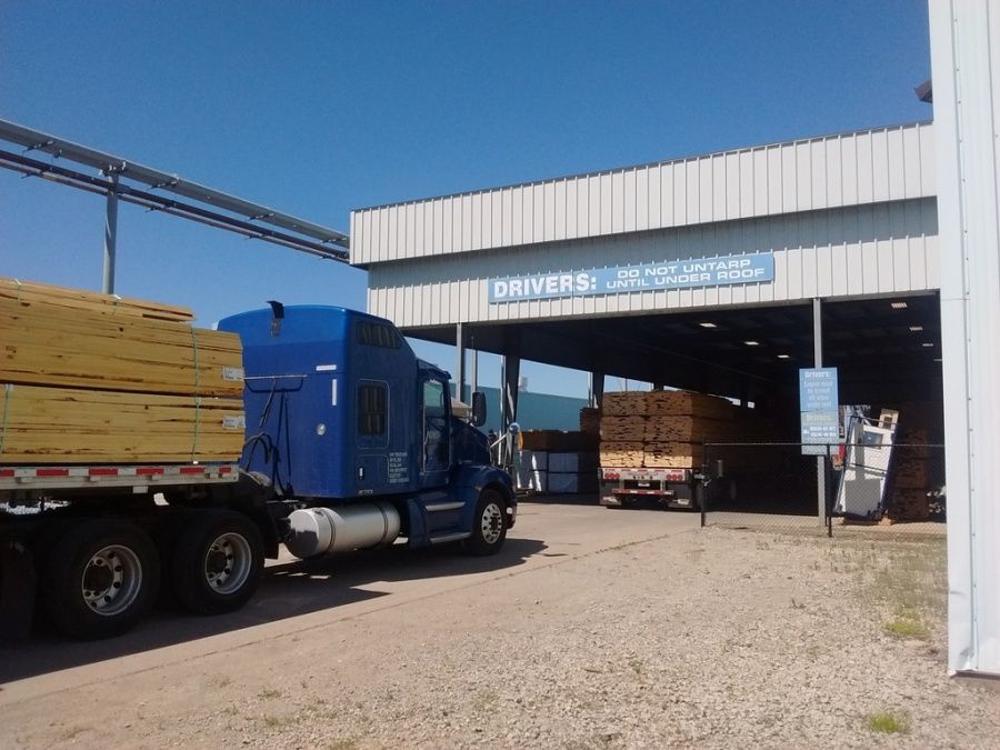 flatbed loaded with Lumber from Bennett Lumber in Princeton, ID being delivering to Pella Windows & Doors in Pella, IA