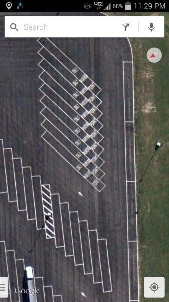 overhead satellite view of truck-stop parking lot
