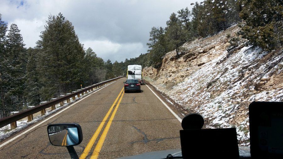 Car stuck behind Prime truck on a steep mountain grade