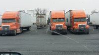 schneider leased trucks parked and waiting for loads