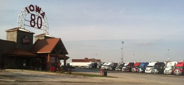Iowa80 truck-stop parking lot with trucks parked in it