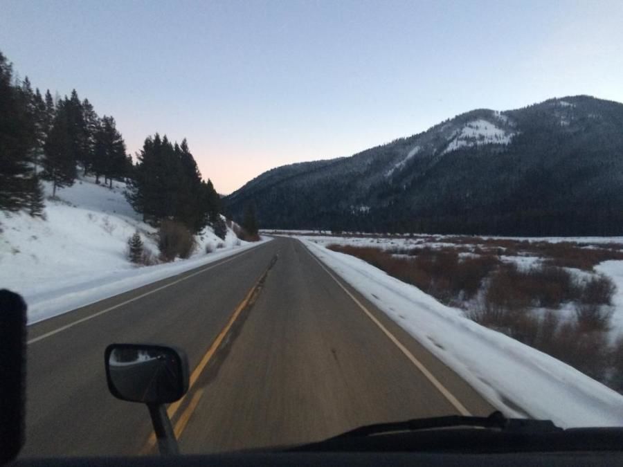 scenery picture of the mountains taken out a truckers windshield