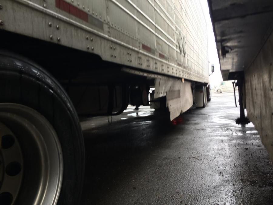 picture of a trailer skirt ripped off by wind