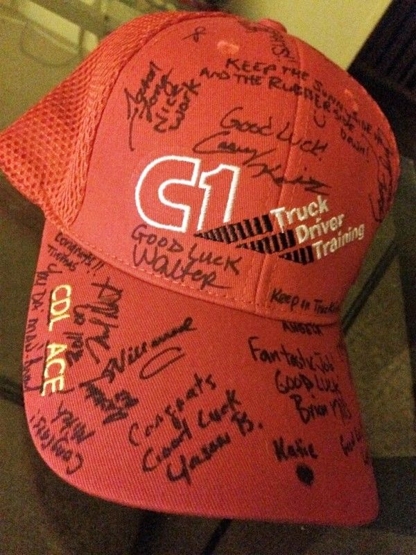 C1 truck driver training red hat autographed after truck driving school