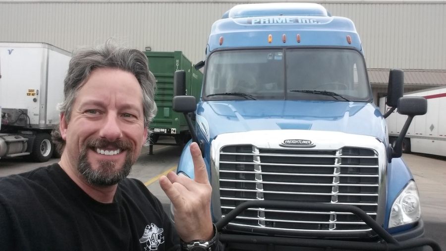 new Prime truck driver happy selfie after getting his own truck solo