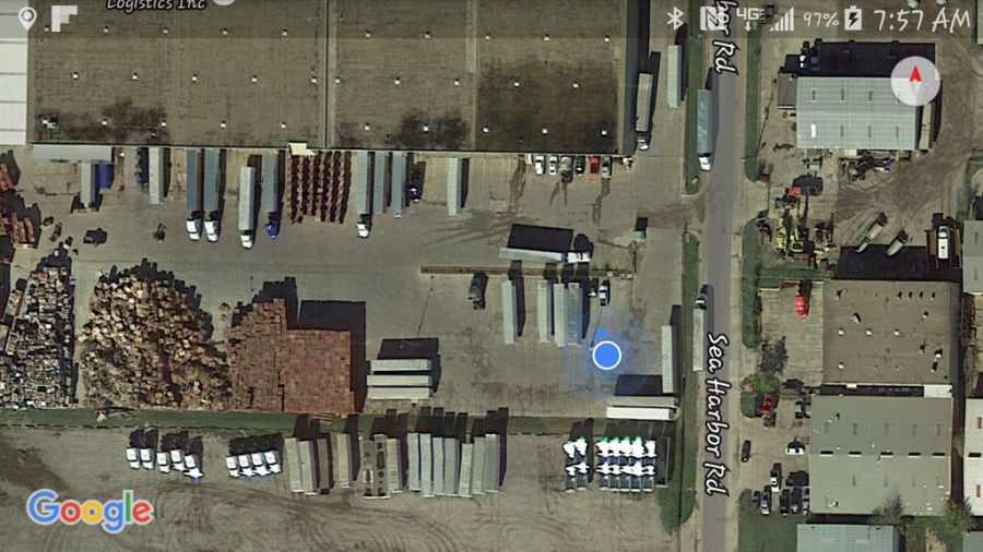 overhead view of truck drivers alley-dock situation