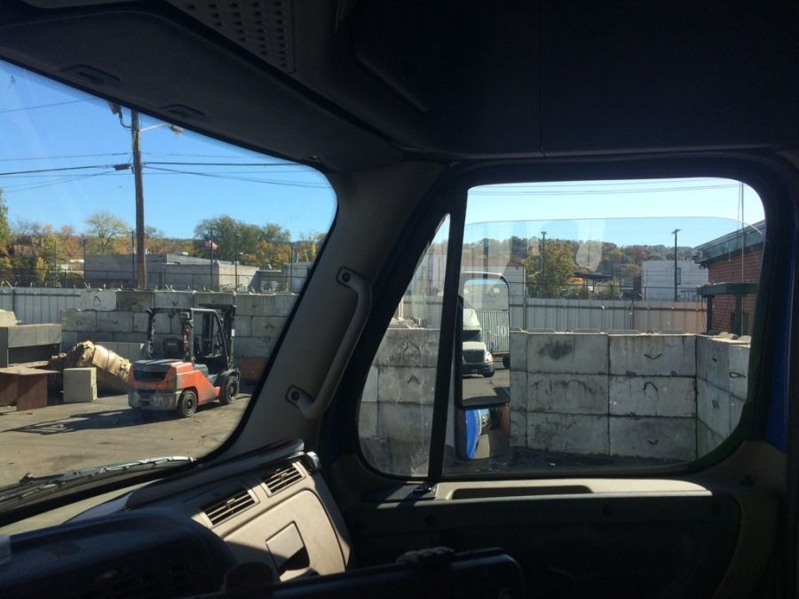 truck driver looking out windshield at Birmingham Recycling 
Birmingham, AL