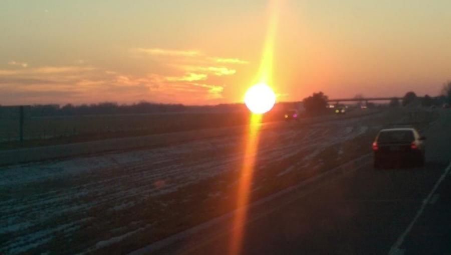 beautiful picture of sunset scenery taken by trucker on the road