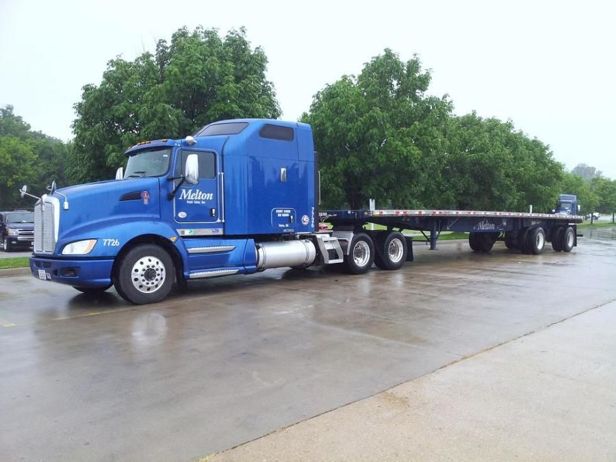 blue Melton flatbed truck and trailer