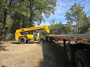 Unloading steel decking.